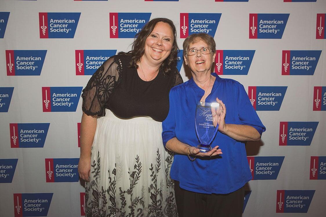 Photo of Laurie Meyers, the winner of this year's Hope Takes Flight Award, with her daughter.